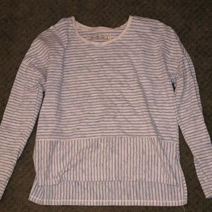 Striped pullover over long sleeves